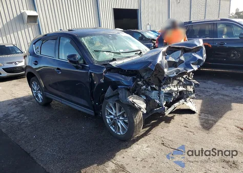 2021 Mazda Cx-5 Grand Touring z USA, uszkodzony, nr VIN JM3KFADM5M0400949